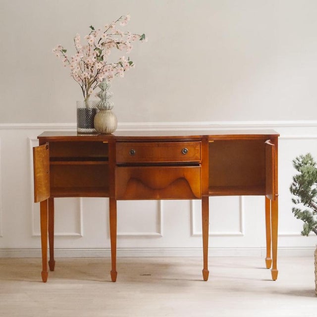 This sideboard was created in the mid-20th century as a high-quality reproduction in the early Biedermeier style. Its...