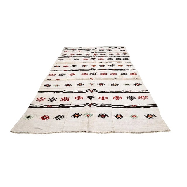 Handwoven vintage hemp kilim rug from Yozgat region of Turkey. Approximately 45-55 years old. In very good condition.