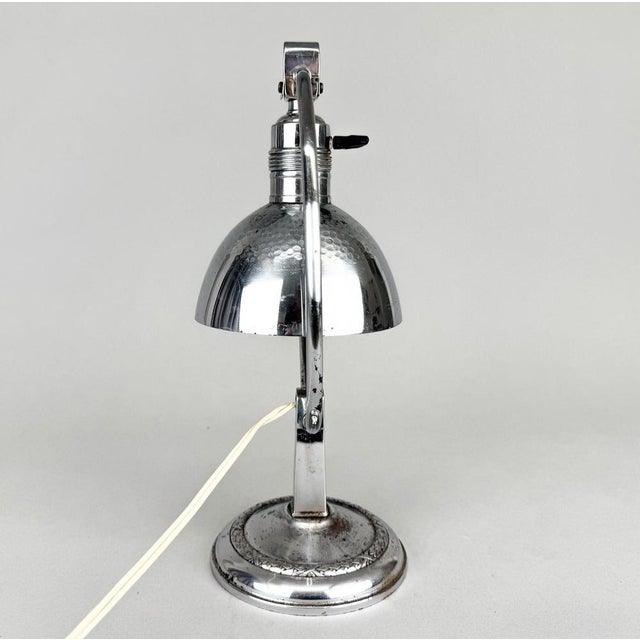 Beautiful chrome art deco table or desk lamp with adjustable shade in three positions on each side as seen in the photos....