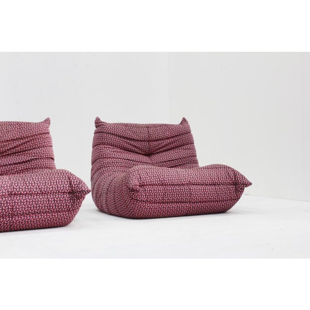 Set of 2 Vintage Togo lounge chairs from Ligne Roset designed by Michel Ducaroy. This togo set is in its original floral...