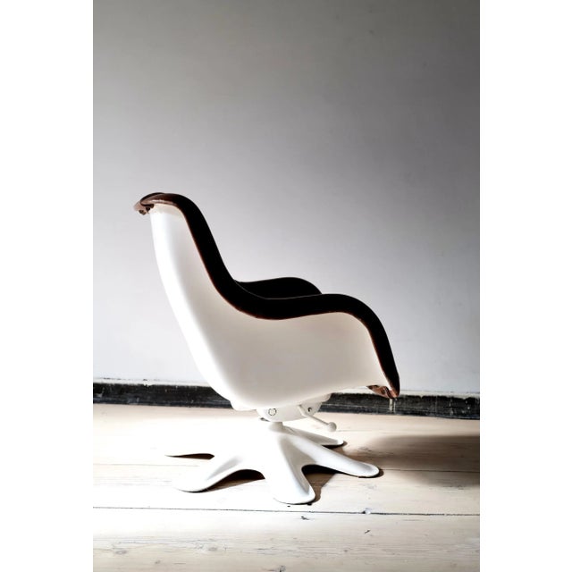 Kukkapuro innovative design with ergonomic seat shell and turn-tilt function. This piece has an attribution mark, I am...