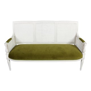 French Louis XVI Style Painted Cane Settee With Green Velvet Seat For Sale