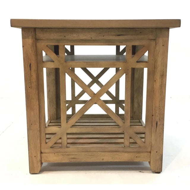 Stylish Regina Andrew organic modern medium wood end table, fret work detail and wooden slats, showroom floor sample