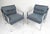 This stunning vintage modern pair of lounge chairs feature a heavy flat bar chrome frame and thick padded seats. The...