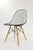 Iconic Eames wire side chair with dowel leg base, designed by Charles and Ray Eames for Herman Miller. This example...
