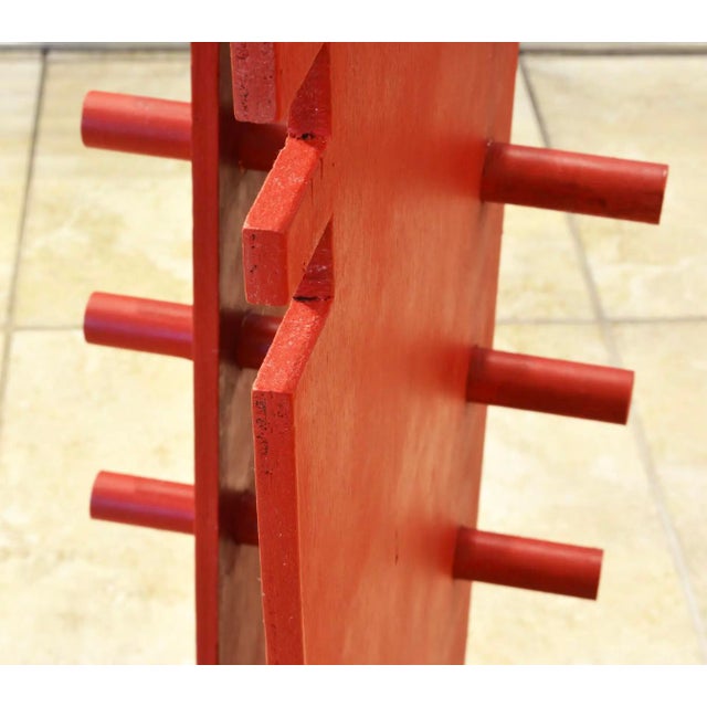 Standing 63 inches tall this cubist style abstract sculpture offers new identities from every new angle. Made with a...