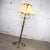 Beautiful monumental sized neoclassical style iron floor lamp with a gilt acanthus leaf design and an enormous parchment...