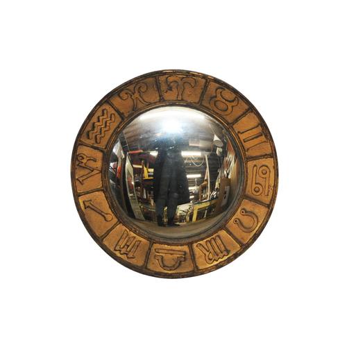This mid-century piece features a circular frame intricately embossed with the twelve signs of the astrology wheel,...