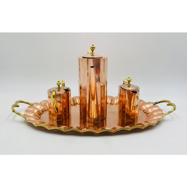 A striking and highly collectible 1940s Mexican sterling silver coffee and tea service set, masterfully crafted in Mexico...