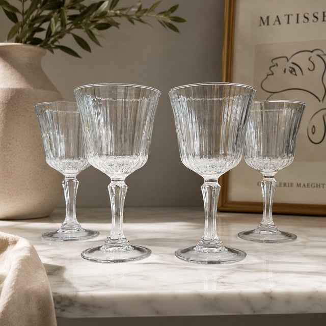 Elegant set of four vintage French wine glasses by Cristal d’Arques-Durand in the discontinued Meridien pattern. Each...