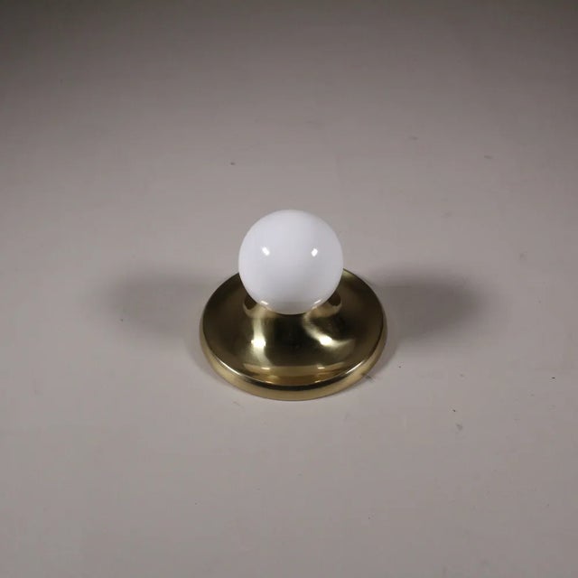 Light Ball Gold Wall Lamp by Achille Castiglioni for Flos, in Good conditions. Designed 1970 to 1979 I have official proof...