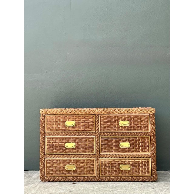 This exquisite six-drawer campaign dresser is a masterclass in mid-century texture and organic design. Hand-crafted with a...