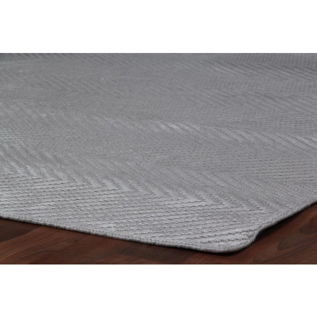 Luxurious Art Silk and a soft color palette come together in subtle, but stunning herringbone pattern to create our...