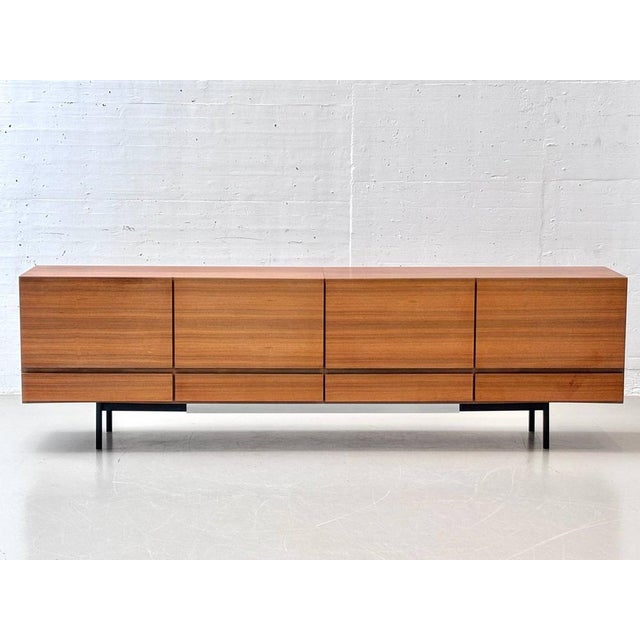 A timeless sideboard with clean, architectural lines and high-quality craftsmanship in solid walnut. The design impresses...
