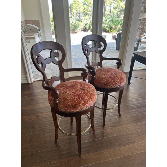 An elegant pair of swivel bar chairs by Century Furniture, crafted in the refined Biedermeier style—known for its clean...