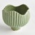 With a ribbed texture and wavy rim, this ceramic pot certainly brings the charm. Finished in a rich, reactive glaze, it...