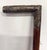 Antique cane, marked "Sterling" on the handle, wood shaft, brass-tone ferrule; No maker mark observed; Measures...