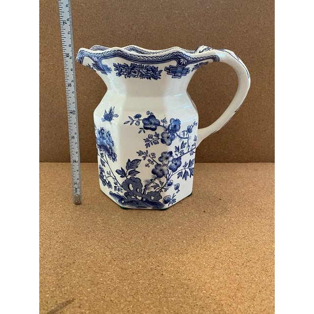 Add timeless English charm to your collection with this **Vintage Mid-Century Modern (MCM) Mason's Ironstone Pitcher**....