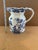Add timeless English charm to your collection with this **Vintage Mid-Century Modern (MCM) Mason's Ironstone Pitcher**....