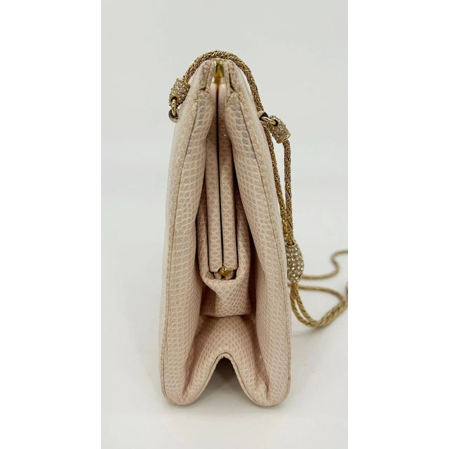Vintage Judith Leiber Pink Lizard Crystal Strap Bag in fair condition. Pale pink lizard leather exterior trimmed with gold...
