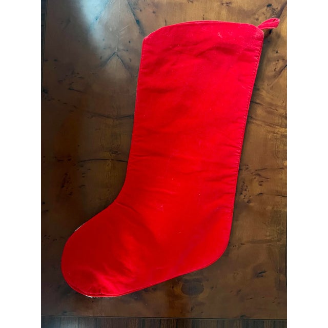 Found at an estate near the US Capital, this hand stitched Santa Claus motif evokes memories of Christmas past and...