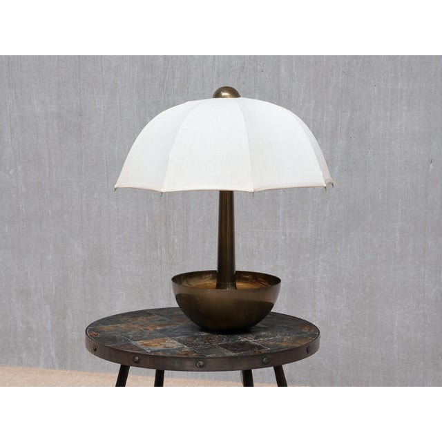 This exceptionally rare table lamp was produced by Il Punto la Bottega in Italy in the 1970s. The lamp is marked with the...