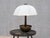 This exceptionally rare table lamp was produced by Il Punto la Bottega in Italy in the 1970s. The lamp is marked with the...