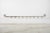 Antique Industrial style butcher's meat hook rack made of wrought iron with distressed silver paint. Originally mounted on...