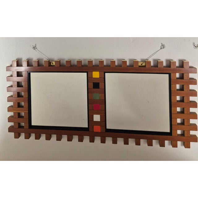Wooden Wall Mirror, 1960s, in Restored conditions. Designed 1960 to 1969 This piece is designed in the style of the...