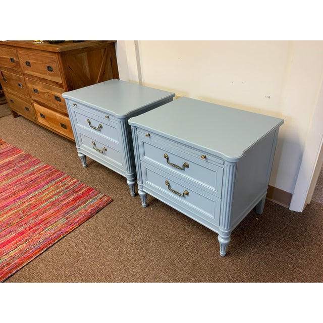 Mid 20th century French style Henredon side tables, two drawers. When pull out shelf is extended depth is 28”. These side...