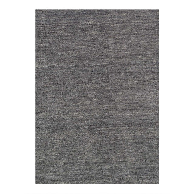 Gabbeh rugs are made by the nomadic Qashqai tribes . They are rough cut and long piled rugs of rich color and best quality...