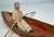 Up for sale is an exquisite antique hand carved wooden Canadian Inuit wooden sculpture depicting a canoeing man. This...