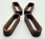 Offered is a set of 4 mid 20th Century Teak wood napkin rings made in Denmark in the 1960s. They each measure: 2.5" W x 1"...