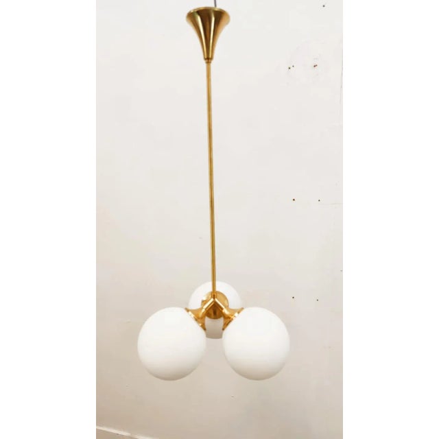 Sputnik Pendant with Three Suspensions, in Restored conditions. Designed 1970 to 1979 Up to 250V (Europe/UK Standard).The...