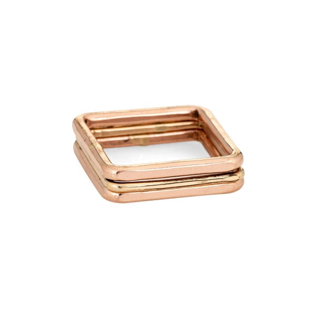 Stylish set of 3 stacking rings crafted in 14 karat rose & yellow gold. The three bands can be worn separately or all...