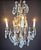 Antique French Bronze and Crystal Chandelier - 7 Lights A rare and elegant French bronze and crystal chandelier, dating...