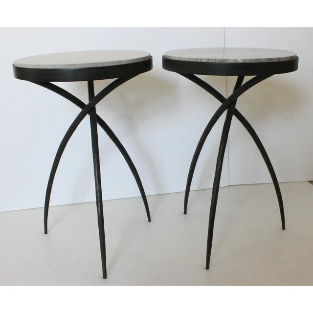 1990s Artisan Side Tables With Marble Tops //Elegantly minimalist, with artisan wrought iron legs//This stylish set of...