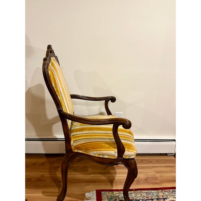 Elegant set of ten vintage Karges Louis XV-style dining chairs, crafted in solid walnut and distinguished by beautifully...