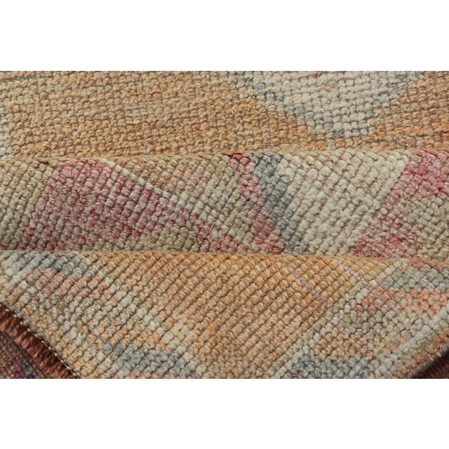 Tribal Medallion Vintage Turkish Oushak Runner in Orange, Blue and Cream For Sale - Image 10 of 11