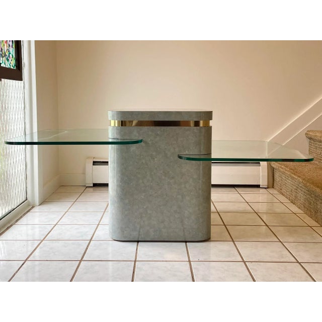 1980's postmodern Karl Springer style cantilever-three level versatile console, sofa or cocktail table, featuring a square...