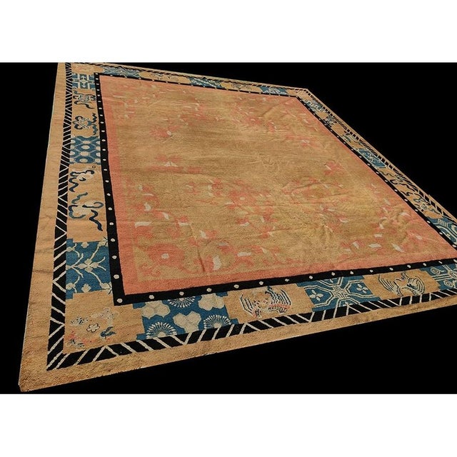 Antique Chinese - Peking Coral 1890s Rug, Circa Date: 1890s. This exceptional late 19th-century Peking weaving represents...