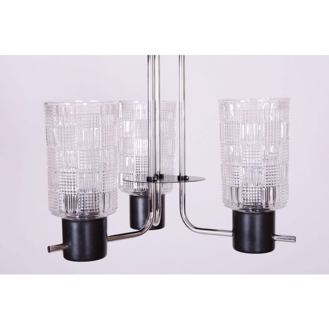 Maker: Drukov This original and visually captivating pendant chandelier, originating from the 1970s, represents an...