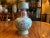 An exquisite 19th-century Chinese porcelain vase from the Qing Dynasty. This piece features the classic 'Famille Rose'...