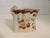 This little rectangle shaped porcelain pitcher has a lot of character from the shape to the handle. I've tried to figure...
