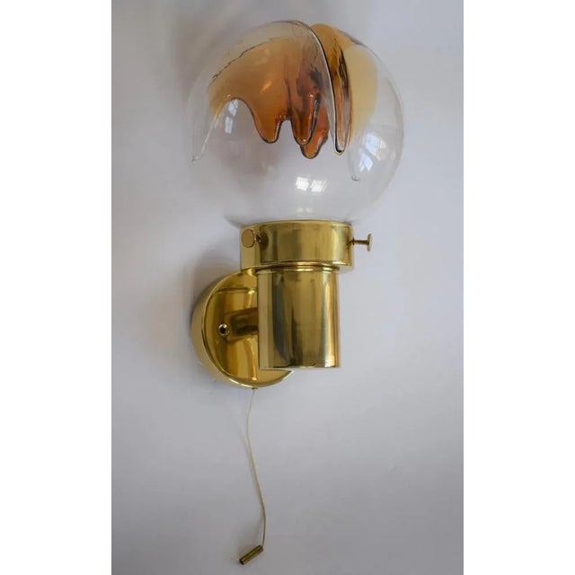 Large wall lamp with hand blown Murano glass ball in stalactite cone look. Very good condition. This piece has an...