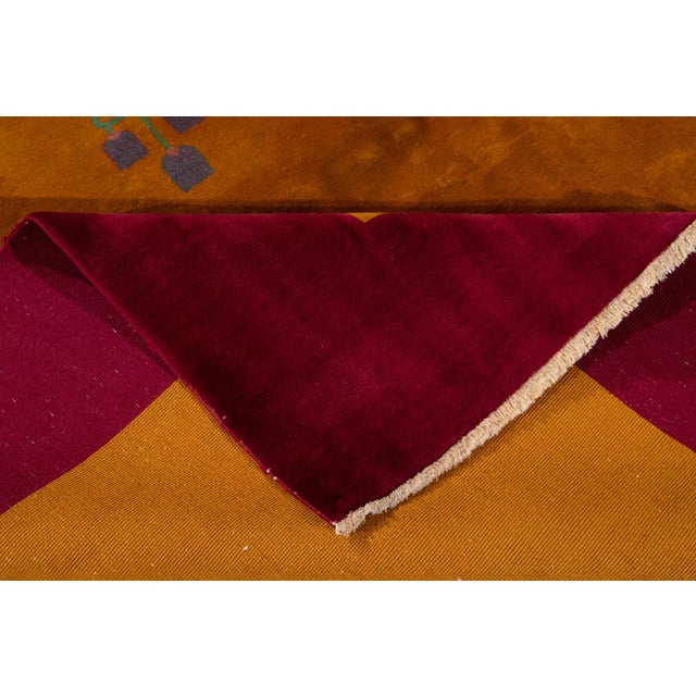 Beautiful antique Chinese Art Deco rug, hand knotted wool with a goldenrod field, red frame in a subtle all-over Classic...