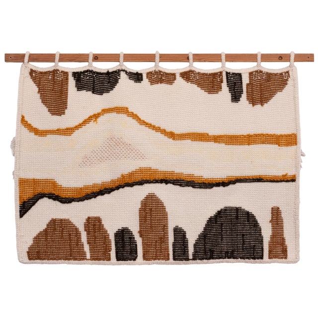 Handmade wall tapestry with an abstract design. Shag rug dating from circa 1970s, Germany. Abstract design in rust brown...