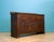 Early 20th century oak sideboard with carved Art Nouveau panels and original brass handles throughout. The design combines...