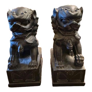 Pair of Cast Metal Foo Dogs For Sale