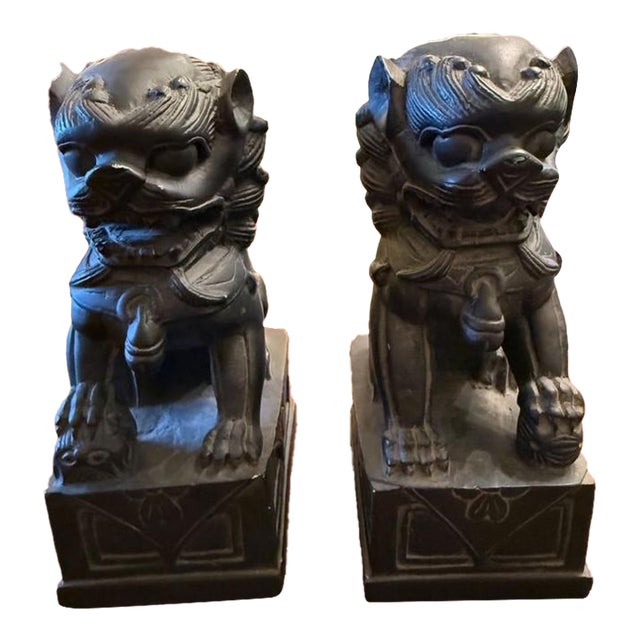 Pair of Cast Metal Foo Dogs For Sale